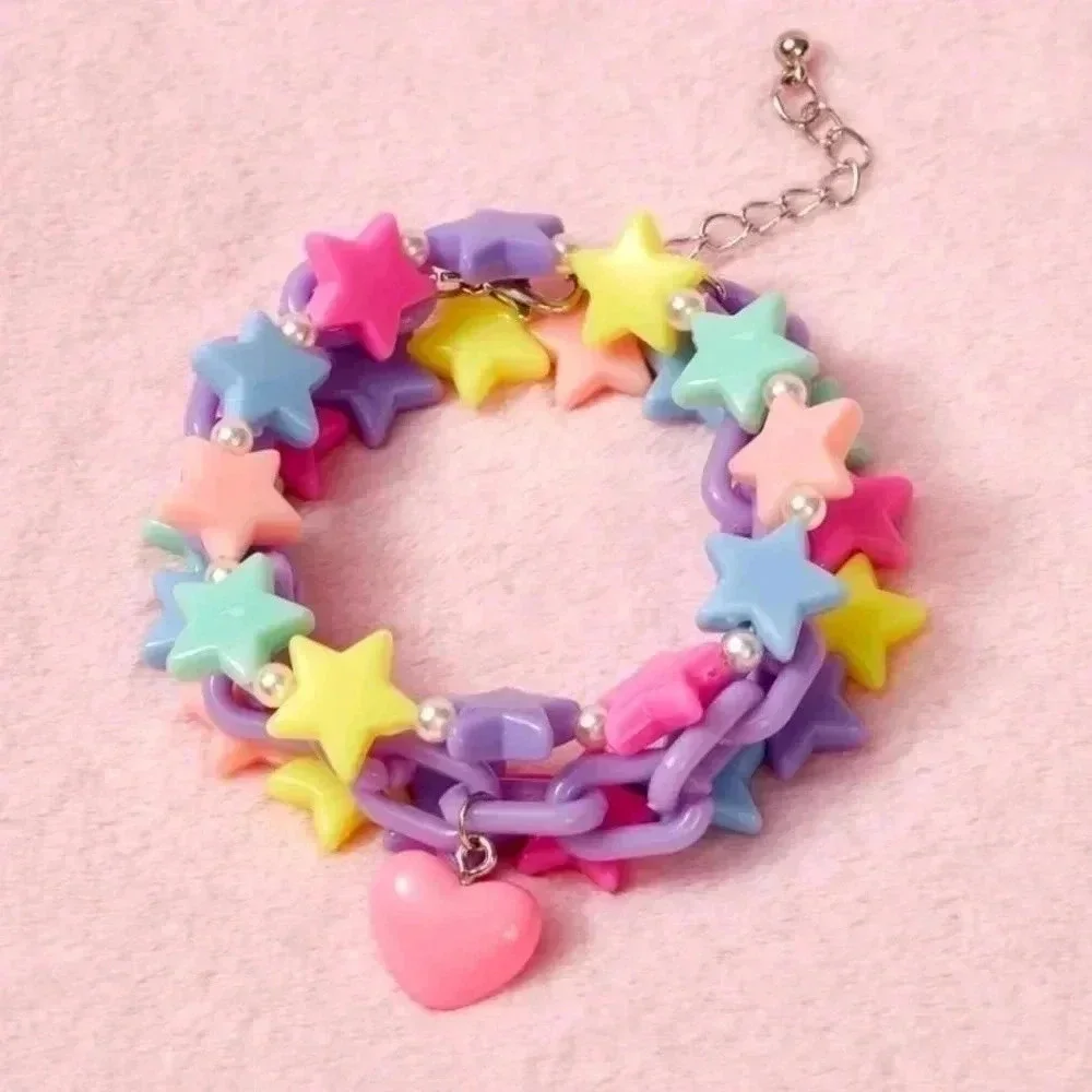 Three piece pastel purple rainbow color graphic Star girls bracelet set jewelry